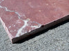Rojo Alicante Rustic Modern Tumbled reddish-pink marble slab with white veining