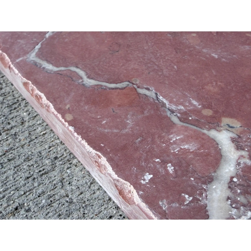 Rojo Alicante Rustic Modern Tumbled reddish-pink stone slab with white veining