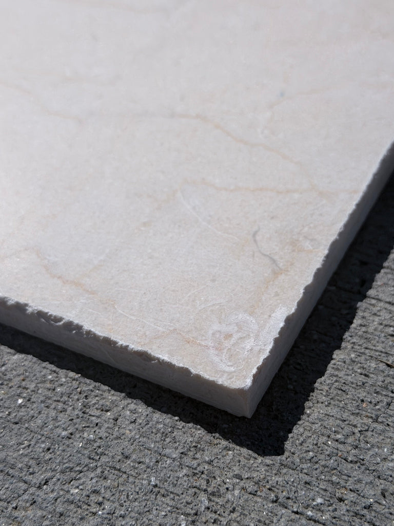 Rojo Alicante Rustic Modern Tumbled off-white marble tile with beige veining