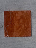 Rojo Alicante Rustic Modern Tumbled reddish-brown marble tile with veining
