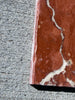 Rojo Alicante Rustic Modern Tumbled red marble slab with white veining