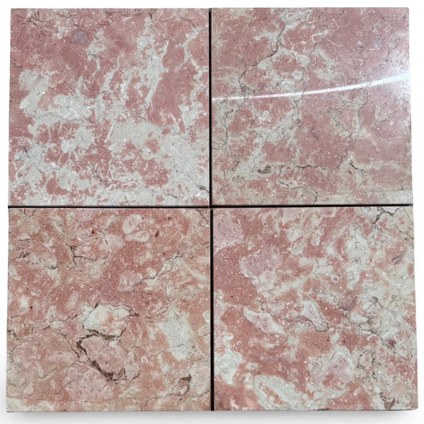 Four polished Rosé Aurora Marble 12x12 tiles with pinkish-red base and veining