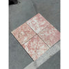 Four pink and white marbled tiles from Rosé Aurora Marble 12X12 Polished collection