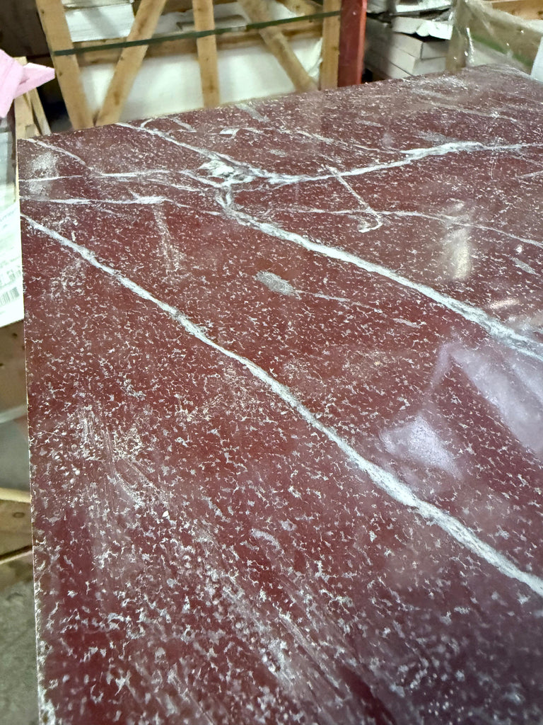 Polished Rosso Laguna Marble slab with dark red color and prominent white veining