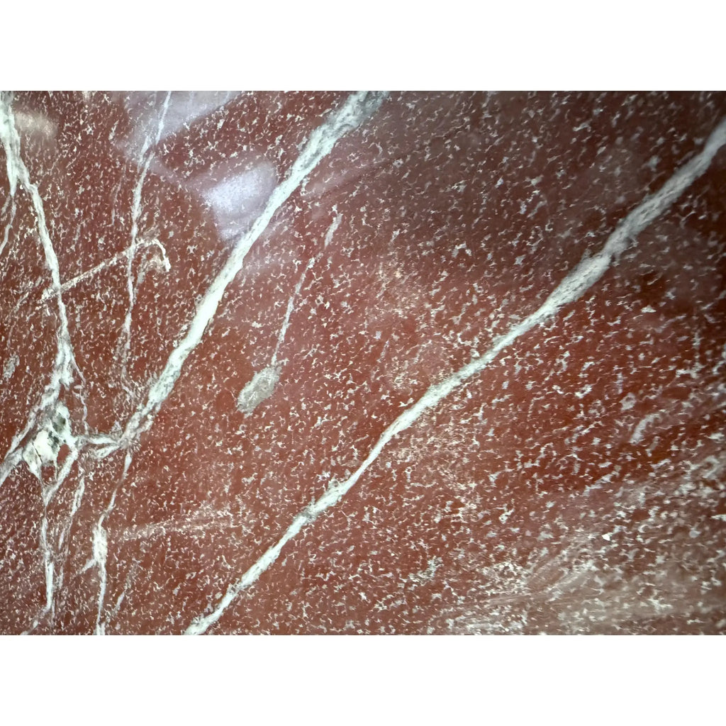 Polished Rosso Laguna Marble with red, white, and light green veining