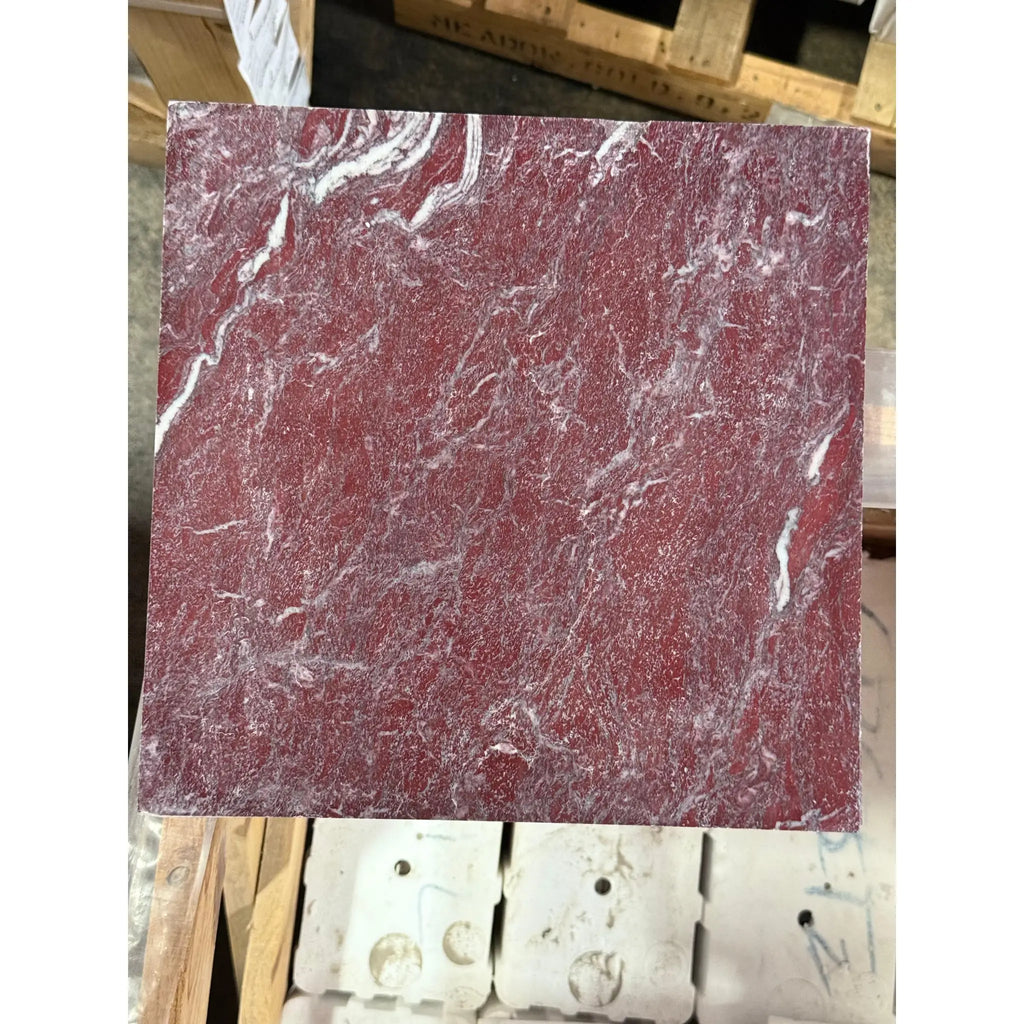 Rectangular slab of Rosso Laguna Marble with deep red color and prominent white gray veining