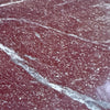 Red granite with white and gray veining in Rosso Laguna Marble product image