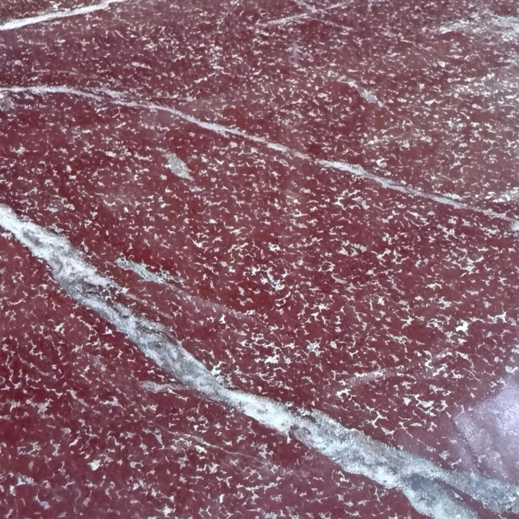 Red granite with white and gray veining in Rosso Laguna Marble product image