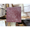 Deep red Rosso Laguna Marble slab with striking white veining for elegant surfaces