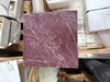 Deep red Rosso Laguna Marble slab with striking white veining for elegant surfaces