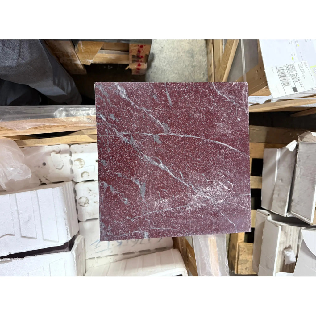 Square Rosso Laguna Marble tile with reddish-purple color and prominent white gray veining