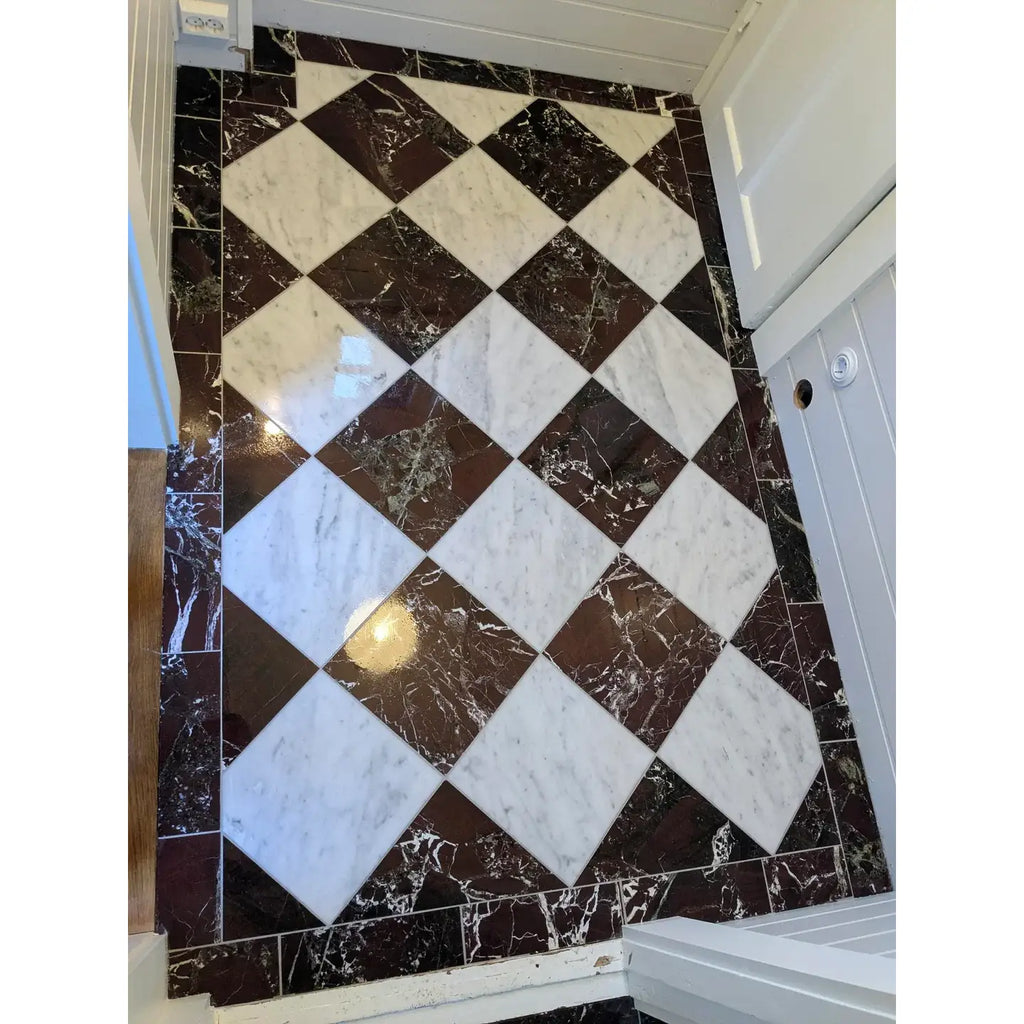 Rosso Levanto Breccia Vino marble 12x12 polished black and white tiles arranged in a diamond pattern