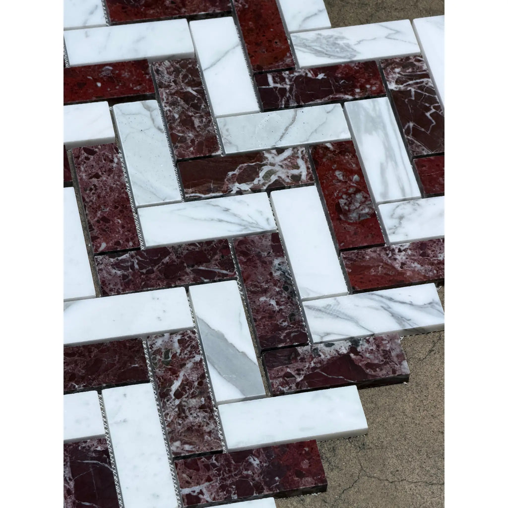 Rosso Levanto and Italian Statuary 1x4 herringbone mosaic marble tile featuring polished white and deep red veined stone