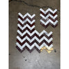 Herringbone mosaic marble tile set with rosso levanto and italian statuary rectangles featuring gold accent piece