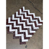 Rosso Levanto and Italian Statuary herringbone mosaic marble tile with polished-honed finish in white and deep red colors