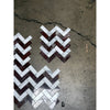 Herringbone mosaic marble tiles in polished-honed rosso levanto and italian statuary white and dark red colors