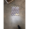 A rectangular polished-honed marble mosaic panel with rosso levanto and italian statuary zigzag pattern