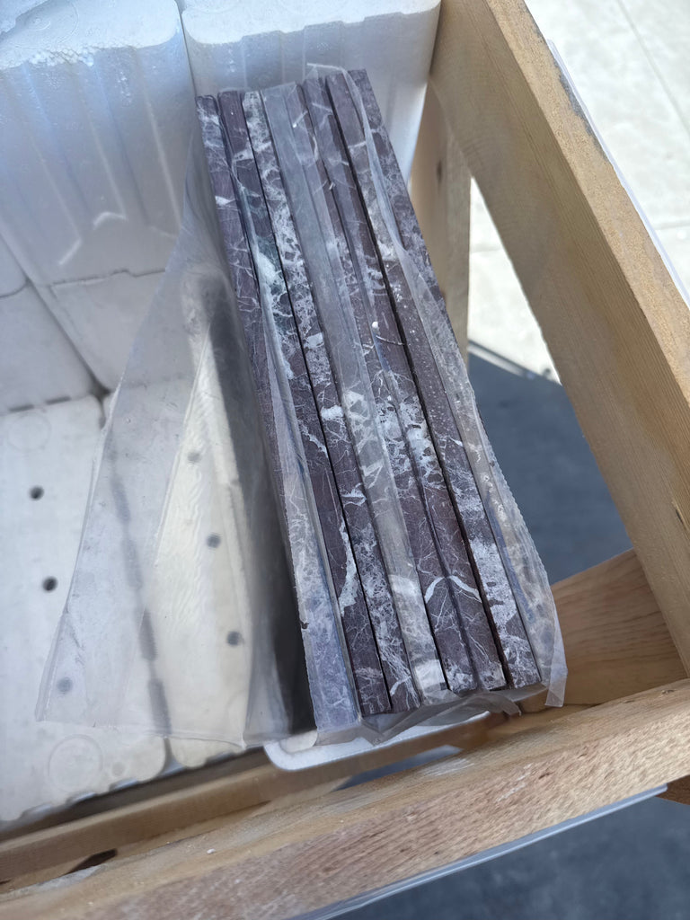 Stacked Rosso Levanto Marble 12X12 Polished tiles in plastic wrap for sale
