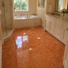 Shiny orange Rosso Verona marble floor tiles 12x12 with subtle white veining and small square inlays honed polished finish