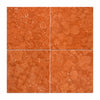 Four square 12x12 tumbled rosso verona marble tiles in terracotta with natural mottled texture and subtle white veining