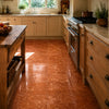Polished rosso verona marble 12x12 tumbled floor tiles with warm earthy hues and natural terracotta veining