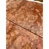 Rosso Verona marble 12x12 tumbled terracotta tiles with mottled earthy red-brown surface and visible cracks