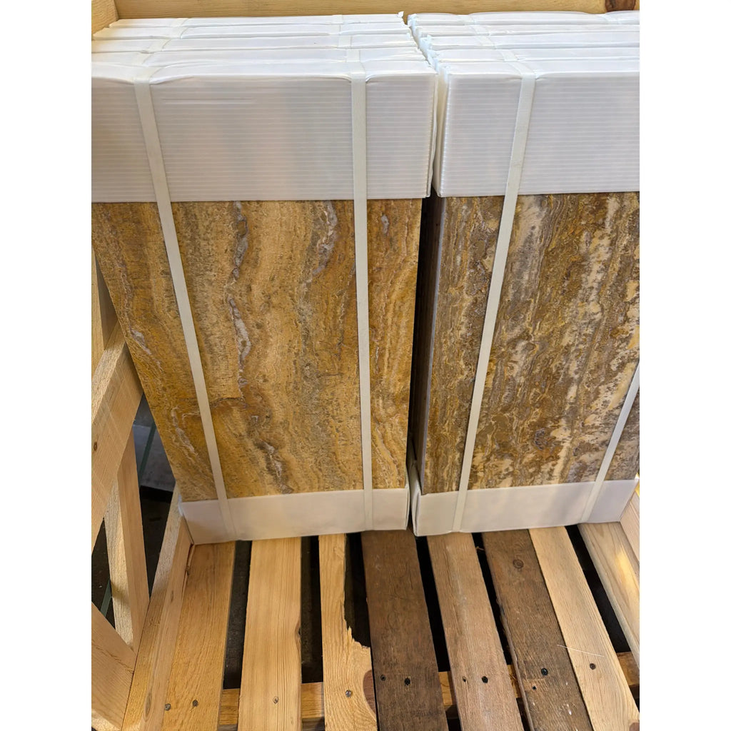 Scabos Autumn Leaves travertine 12x24 cross-cut filled polished tiles, stacked golden-brown marble with veining in white wrap