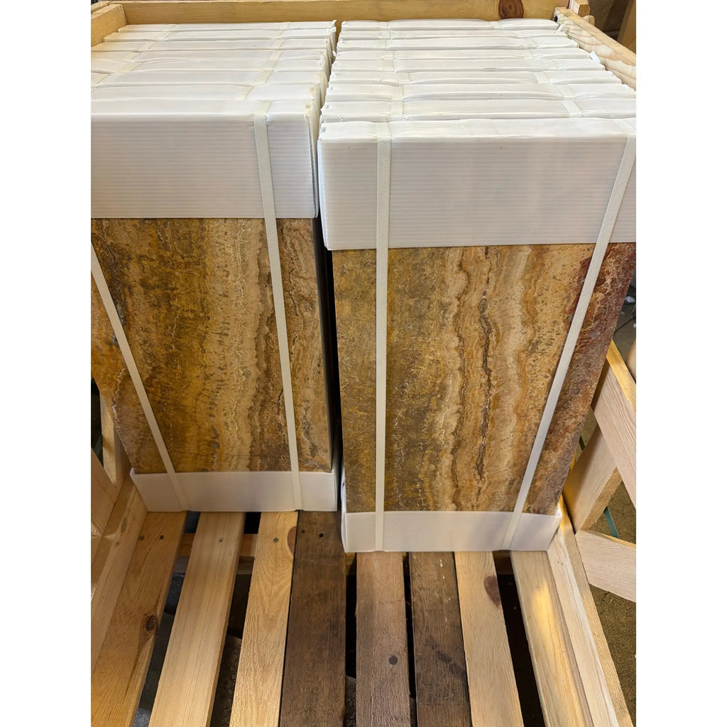 Scabos Autumn Leaves Travertine 12x24 vein-cut filled polished marble panels, stacked and strapped