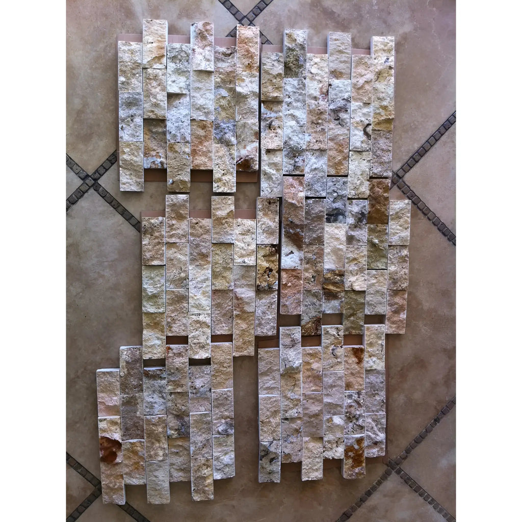 Textured natural stone mosaic tiles in beige, brown, and grey arranged vertically