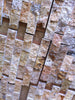 Textured stone wall cladding in natural hues for Scabos Autumn Leaves Travertine Mosaic