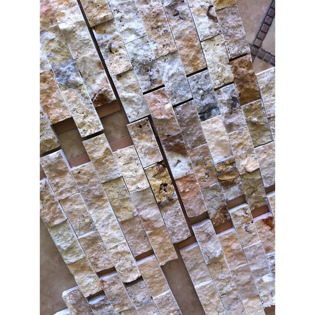 Natural rough-textured multi-toned Travertine tile with varying rectangular pieces