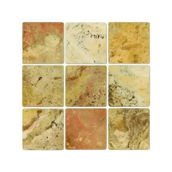 Nine square Scabos Travertine 4X4 Tumbled tiles arranged elegantly on a surface