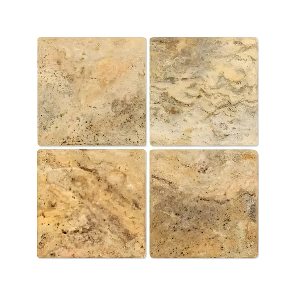 Four Scabos Travertine 6X6 Tumbled stone tiles showcasing natural texture