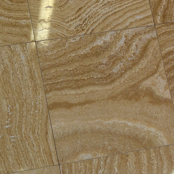 Beige and tan Scala Nova Walnut Wavy travertine 12x12 marble-patterned floor tiles with natural veining