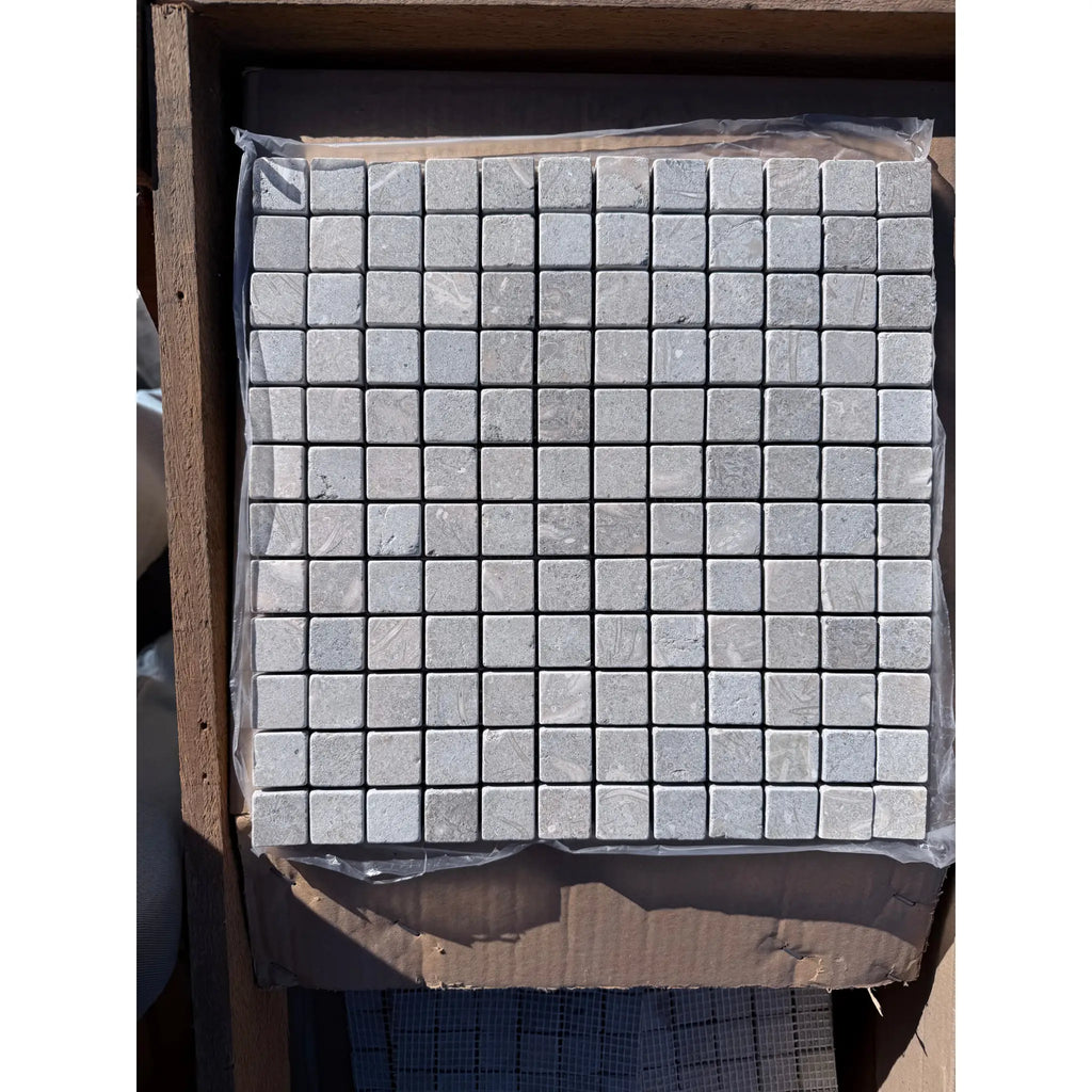 Gray Seagrass Limestone 1x1 tumbled mosaic tiles in square grid