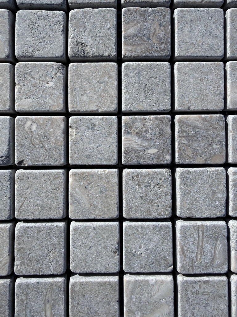 Gray Seagrass Limestone 1x1 mosaic tiles with tumbled, textured veining