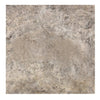 Square tile featuring a mottled beige and gray pattern in Silver Travertine 12X12