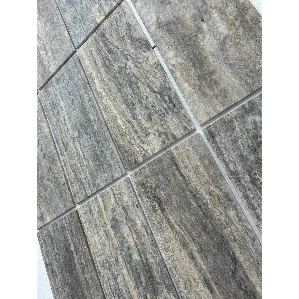 Silver gray travertine 12x24 tile vein cut filled honed polished with gray stone effect natural veining and subtle texture