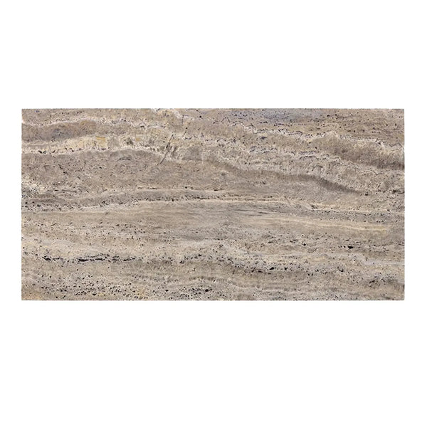 Beige travertine slab showcasing porous texture in Silver Gray Travertine tile