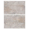 Two gray travertine tiles from the Silver (Gray) Travertine 16X24 collection