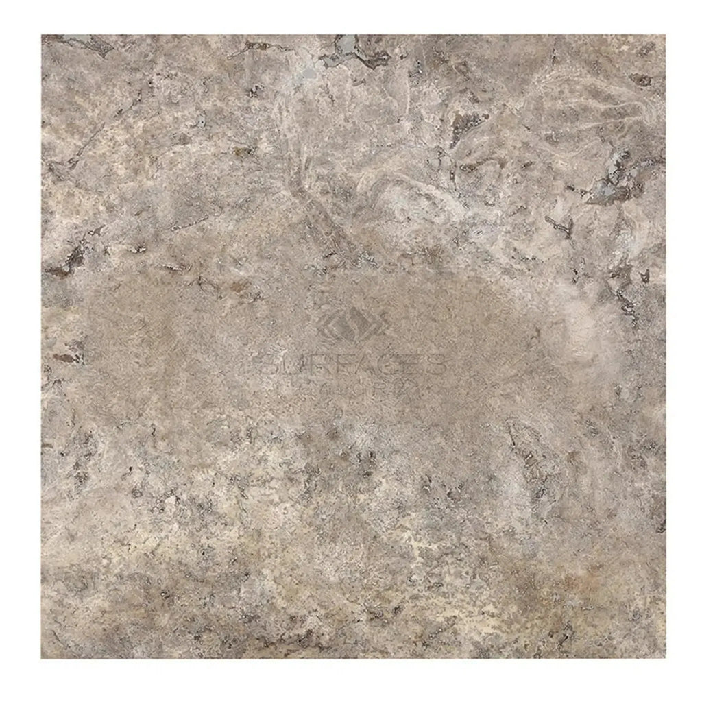 Square tile featuring mottled gray-brown surface of Silver Gray Travertine 18X18