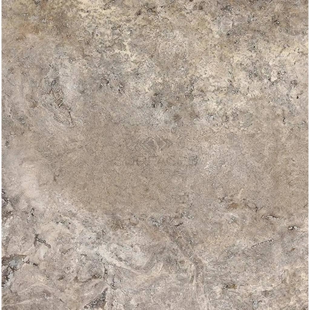 Textured beige stone surface of Silver Gray Travertine 18X18 Tile Filled and Honed