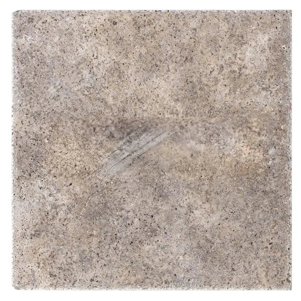Square mottled gray tile from Silver Travertine 18X18 with brushed and chiseled edge