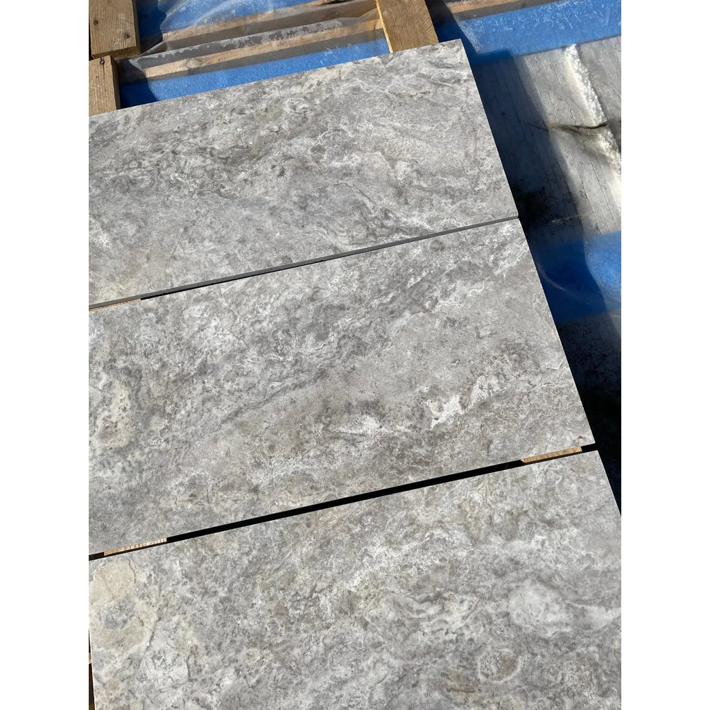 Gray marble tiles featuring Silver Gray Travertine 1X1 Mosaic Tumbled design