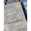 Gray marble tiles in Silver Travertine 24X24 Tile Filled and Honed for elegant flooring