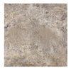 Square tile featuring a mottled gray-brown pattern from Silver Travertine 24X24 collection