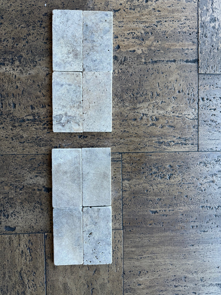 White textured ceramic or porcelain tiles from Silver Gray Travertine 3x6 Tumbled collection