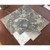 Assorted square marble tiles featured in Sky Blue Azul Cielo 12X24 Marble Tile