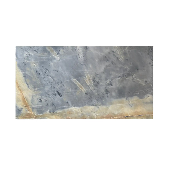 Gray and gold marble slab featured in Sky Blue Azul Cielo 12X24 Marble Tile
