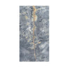 Gray marble slab with golden vein featured in Sky Blue Azul Cielo 12X24 Marble Tile
